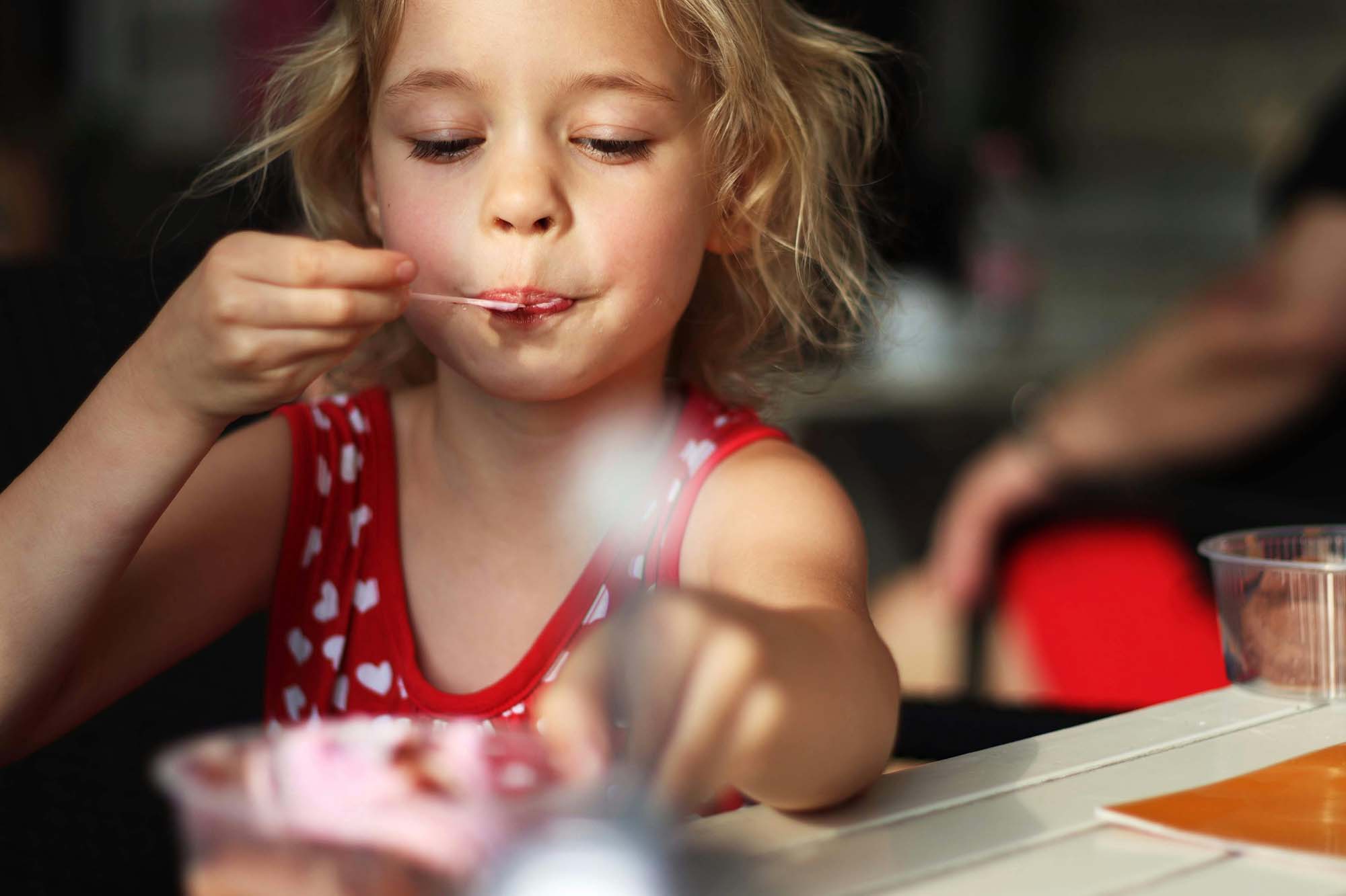 Child eating at the Grill at Solway Park, Waiararapa